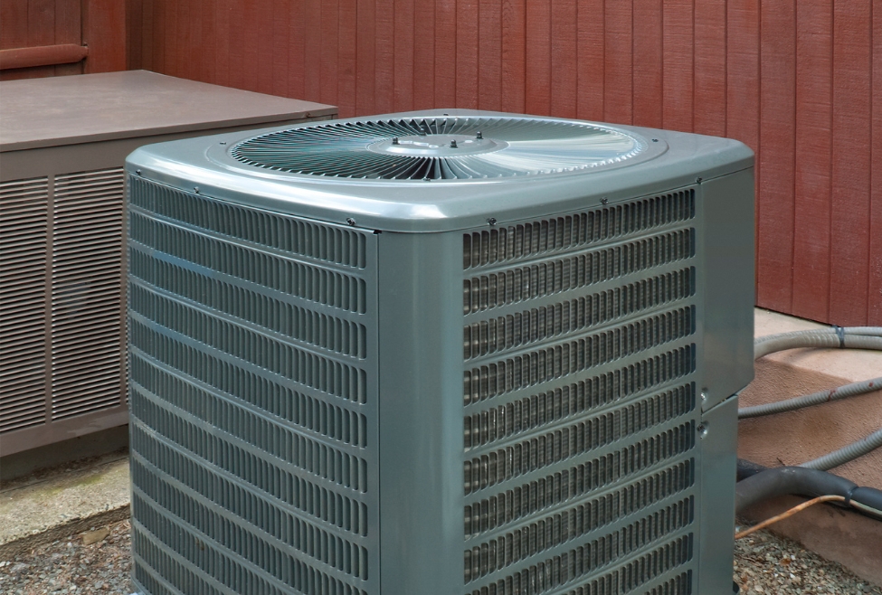 Outdoor residential air conditioner serviced for routine AC maintenance, showing a clean and functioning HVAC unit—ideal for understanding what an AC tune up includes, such as coil cleaning, refrigerant checks, and system inspection by Family Heating and Cooling. Call today for help with AC tune up checklist, what’s included in an AC tune up, air conditioner maintenance service, AC inspection near me, HVAC tune up services, seasonal AC maintenance, air conditioning service near me, air conditioner tune up near me, home AC maintenance, central air conditioner service, HVAC maintenance near me, AC system check up, professional AC cleaning, condenser coil cleaning, refrigerant level check, thermostat inspection, air filter replacement, blower motor inspection, residential AC services, annual AC maintenance plan, HVAC system tune up near me, air conditioning maintenance in New Bedford, Fall River AC services, Taunton HVAC contractors, Somerset air conditioner repair, Dartmouth HVAC tune up, Fairhaven AC maintenance.