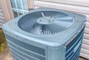 Air conditioner showing signs of a refrigerant leak, including ice buildup and weak airflow — common HVAC issues addressed by Family Heating and Cooling with expert AC repair, refrigerant recharge, and leak detection services. Reach out now for help with what happens if you have a refrigerant leak, signs of refrigerant leak in AC, refrigerant leak symptoms, AC not cooling due to refrigerant leak, how to detect a refrigerant leak, air conditioner losing refrigerant, Freon leak in home AC, dangers of refrigerant leaks, AC blowing warm air, AC repair for refrigerant leak, refrigerant leak repair near me, HVAC refrigerant recharge, emergency AC repair near me, HVAC leak detection services, refrigerant leak detection near me, how much does it cost to fix a refrigerant leak, low refrigerant in air conditioner, Family Heating and Cooling AC services, air conditioner not cooling properly, AC inspection services near me, HVAC maintenance near me, central air not cooling issues, leaking AC unit repair near me.