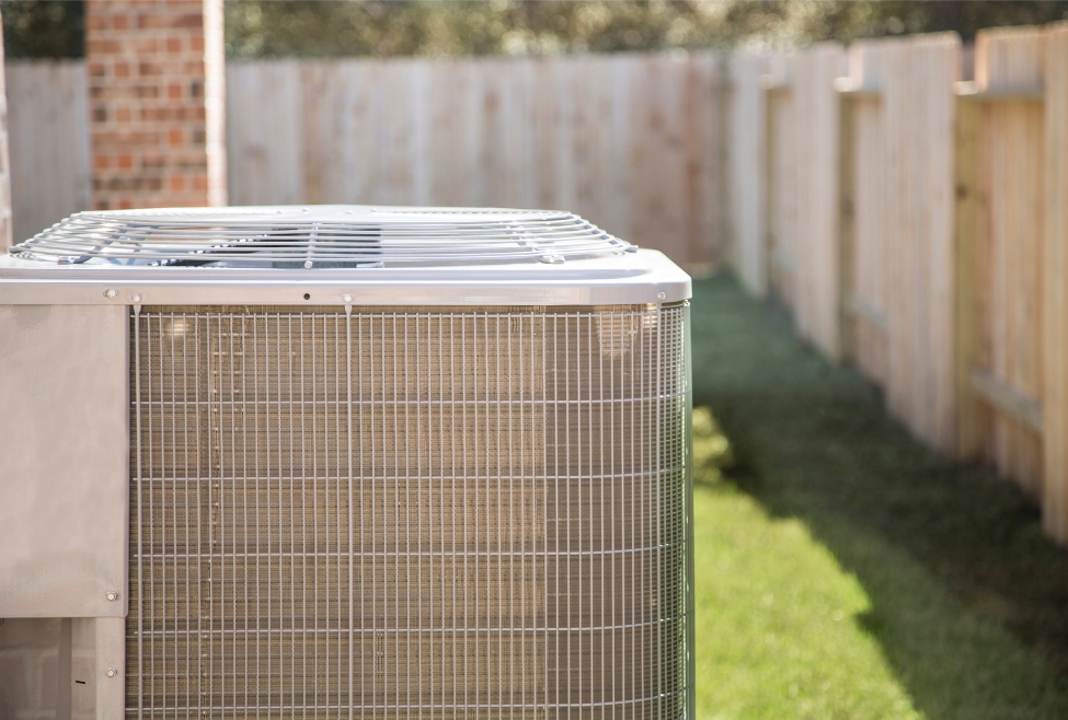 Residential air conditioner blowing hot air, possibly due to low refrigerant, dirty air filter, or faulty thermostat — common AC repair issues handled by Family Heating and Cooling's HVAC technicians. Trust us to help you with ac blowing hot air, AC not cooling, air conditioner blowing warm air, central air blowing hot air, HVAC blowing hot air, why is my AC not cold, AC repair near me, emergency AC service, air conditioning troubleshooting, home AC blowing warm air, AC blowing hot air fix, low refrigerant symptoms, AC recharge service, thermostat problems AC, air filter clogged AC, AC unit blowing hot air in house, air conditioning repair near me, HVAC repair near me, AC service near me, air conditioning maintenance, Family Heating and Cooling AC services, AC compressor problems, broken air conditioner repair.