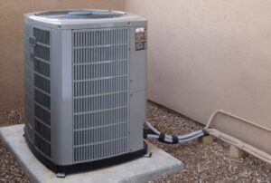 Residential air conditioner with symptoms of a bad AC capacitor, such as warm air, humming noise, and delayed startup; HVAC repair and AC capacitor replacement services by Family Heating and Cooling. Contact us today for help with bad AC capacitor symptoms, signs of a failing AC capacitor, how to tell if AC capacitor is bad, AC not cooling due to capacitor, AC won't start capacitor issue, air conditioner humming but not running, AC capacitor replacement near me, HVAC capacitor repair near me, capacitor issues in central AC, residential AC repair services, emergency AC repair near me, air conditioner repair New Bedford, HVAC repair Fall River, AC not working in Taunton, air conditioning service Dartmouth, HVAC technician Somerset, AC inspection Fairhaven, cooling repair Westport, replace AC capacitor cost, air conditioning troubleshooting near me, AC repair services in Raynham, capacitor problems in air conditioner, HVAC system not turning on, Family Heating and Cooling AC service, HVAC capacitor replacement near me, cooling system diagnostics Acushnet, fast air conditioner repair Seekonk, air conditioning contractor Swansea, HVAC repair Dighton, broken AC diagnosis Rehoboth, fix AC in North Dartmouth, South Dartmouth AC repairs, East Taunton air conditioning services, Assonet HVAC repairs, East Freetown air conditioner replacement, North Dighton HVAC company, capacitor repair Berkley, Raynham Center air conditioner troubleshooting, Westport Point AC maintenance.
