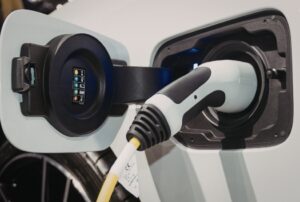 An EV charger installed at home, demonstrating the best EV charger for home options, including Level 2 home charging, 240V outlet installation, and safe residential electric vehicle charging by Family Heating, Cooling, Electric and Plumbing. Call us today for help with best EV charger for home, home EV charging station, Level 2 EV charger installation, electric car charger for home, residential EV charger, 240V outlet installation for EV, EV charger installation near me, home electric vehicle charging, fastest home EV charger, smart EV charger for home, wall-mounted EV charger, EV charging solutions, electric vehicle charging station installation, safe home EV charging, home EV charger repair, EV charger setup, EV charger maintenance, EV charging installation services, professional EV charging installation near me, home EV power upgrade.