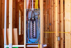 Electrical rewiring in a home by Family Heating, Cooling, Electric and Plumbing, showing safe installation of modern circuits, updated outlets, and breaker panels. Learn how often should you rewire your house, recognize signs of outdated wiring, and prevent electrical hazards with professional home rewiring and electrical inspection services. Reach out now for help with how often should you rewire your house, house rewiring, home electrical rewiring, residential rewiring services, rewiring an old house, signs your home needs rewiring, electrical panel upgrade, breaker replacement, aluminum wiring replacement, knob and tube wiring update, outdated wiring repair, home rewiring near me, professional rewiring services, licensed electricians near me, home electrical inspection, circuit replacement, rewiring contractors, emergency rewiring repair, rewiring cost estimate, home safety electrical upgrades, modernizing home wiring, rewiring for high-demand circuits, full house rewiring, partial home rewiring, rewiring older homes, electrical troubleshooting and rewiring, family heating cooling electric and plumbing rewiring, rewiring solutions near me, residential electrical upgrades.