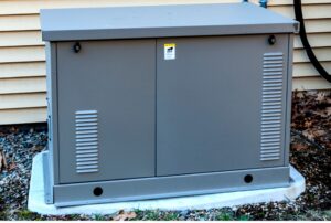 Residential standby generator installed outside a home, highlighting generator installation costs, backup power solutions, and professional electrical services from Family Heating, Cooling and Electric. Call us today for help with how much does it cost to install a generator, generator installation cost, whole house generator cost, standby generator installation price, home generator installation, backup generator cost, residential generator installation, automatic transfer switch installation, electrical panel upgrades for generators, licensed generator installer, emergency power solutions, generator installation near me, whole house generator near me, backup generator installer near me, generator electrician near me, electrical services near me, home backup power systems, natural gas generator installation, propane generator installation, generator wiring and permits, affordable generator installation, professional generator services, Family Heating, Cooling and Electric generator installation.