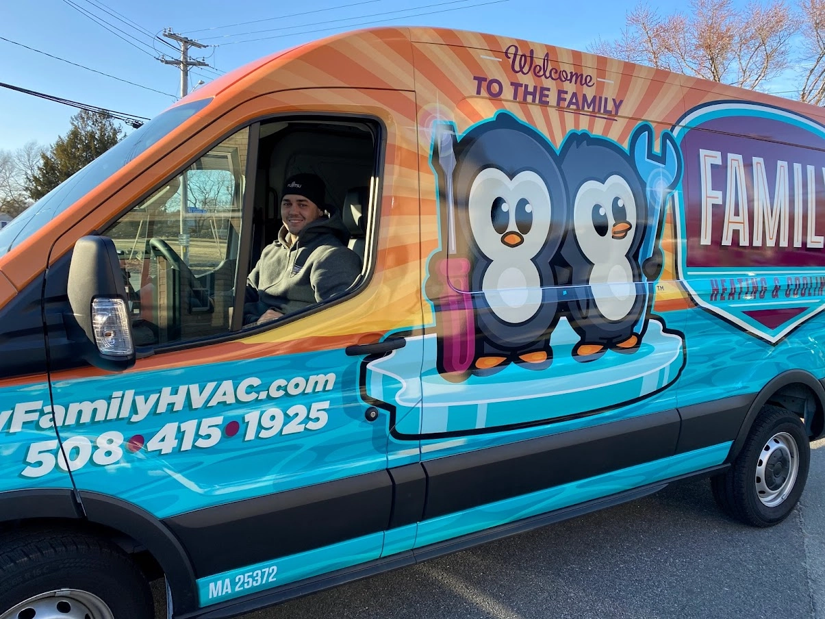 Family Heating, Cooling, Electric & Plumbing service van featuring the company’s penguin mascots