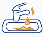 Sink with orange and rust stains from water deposits.